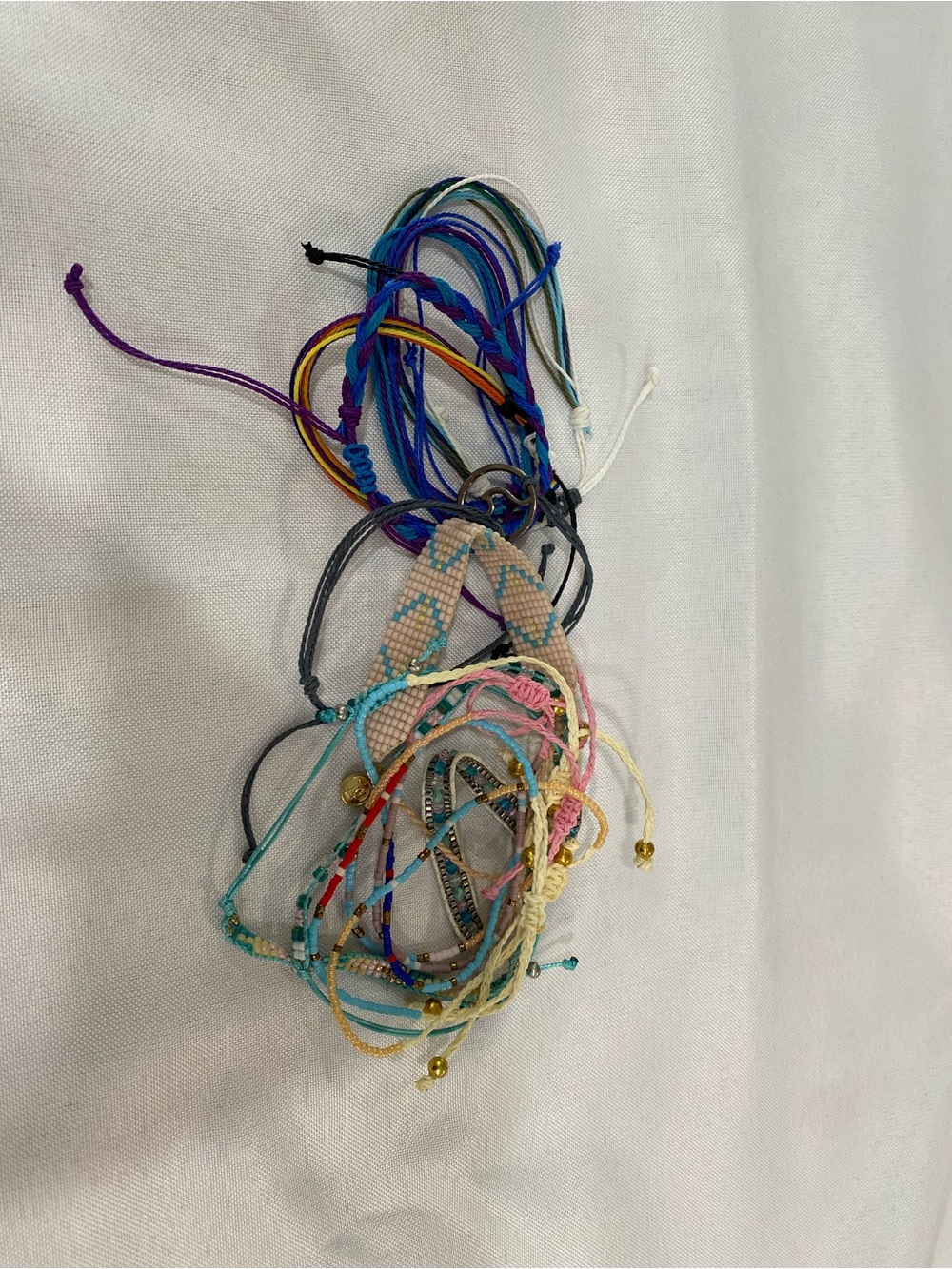 Colorful Stack of Woven & Beaded Friendship Bracelets